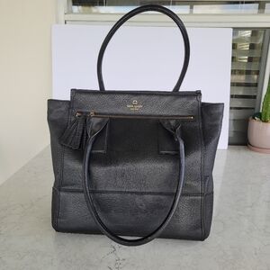KATE SPADE New York black leather tote bag.